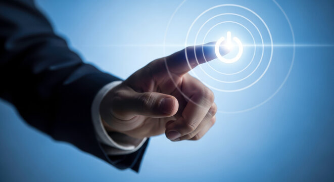 Hand pressing power button technology innovation digital interface start up system activation