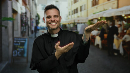 Smiling priest gestures happily on a bustling city street with outdoor cafe.
