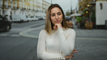Fototapeta premium Woman pondering on the street with thoughtful expression amidst urban backdrop depicting everyday life in autumn setting outdoors