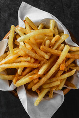 Crispy Golden French Fries Served in a Rustic Wooden Bowl
