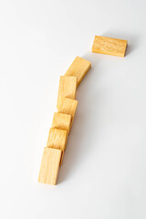Wooden Blocks in a Creative Arrangement on a White Background