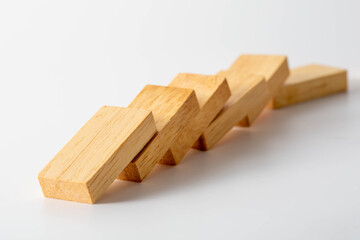 Wooden Building Blocks Arranged in Diagonal Line on White Surface