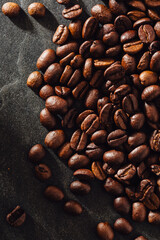 Freshly Roasted Coffee Beans on Dark Stone Surface