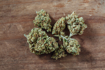 High-Quality Cannabis Buds on a Wooden Surface for Natural Appeal
