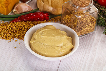 Dijon mustard sauce in the bowl