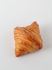Flaky Croissant Pastry Isolated on White Background for Bakery Themes