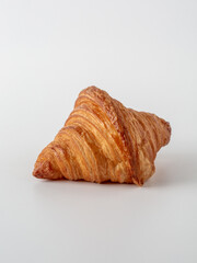 Flaky Golden Croissant on White Background Ready for Breakfast Delight