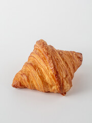 Flaky and Golden-Brown Croissant on White Background