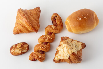 Assorted Delicious Pastries on White Background for Bakery Use