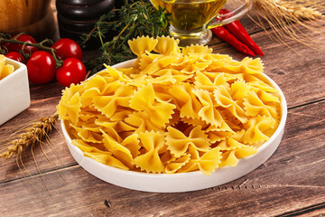 Raw dry Italian pasta - farfalle