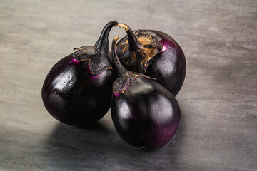 Raw violet and black eggplant