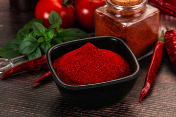Spicy dry paprika powder in the bowl