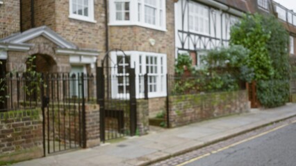 Obraz premium Blurred view of a classic english street in chelsea, london during winter, showcasing historic architecture and charm with an out-of-focus bokeh effect.