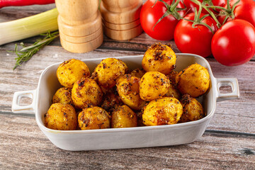 Baked small baby potato with herbs