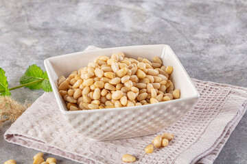 Cedar nut kernel in the bowl