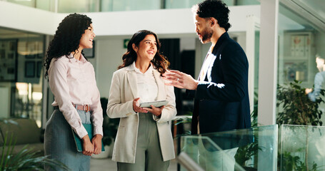 Businessman, women and discussion in lobby with team, tablet and happy for deal at insurance...