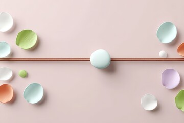 Minimalist abstract composition with colorful ceramic shapes on pink background