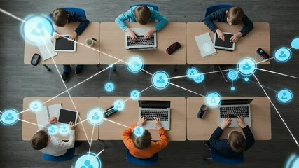 Students working on digital devices in a classroom, connected by a network - Powered by Adobe