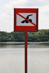 Square Warning Sign With A Red Border And Crossed Out Swimmer Icon, Indicating 