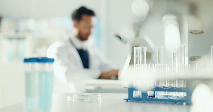 Science, sample and test tube in lab for study, medical research and medicine development. Healthcare, pharmaceutical and blur of scientist with equipment for analysis, biology and experiment