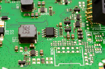 Printed circuit boards with electronic components close-up, photo for a project about the...