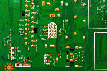 Printed circuit boards with electronic components close-up, photo for a project about the...