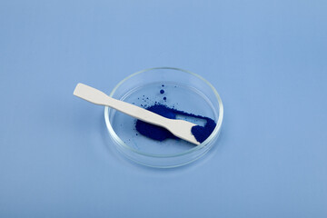 Brilliant blue FCF, dye powder. Triarylmethane dye known also as D&C Blue No. 4. Organic pigment...