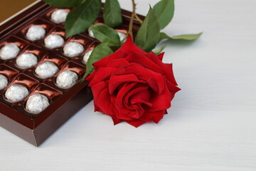 A beautiful rose, a small gift, a heart and a box of chocolates will make us happy any day