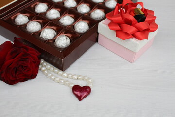 A beautiful rose, a small gift, a heart and a box of chocolates will make us happy any day