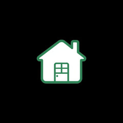 A house with a green trim and a white door. The house is small and has a window