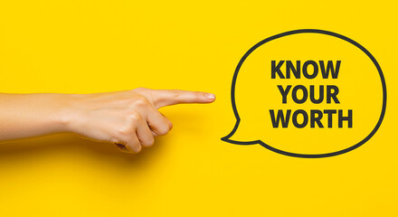 A hand pointing at a speech bubble with the text know your worth on a yellow colored background wall