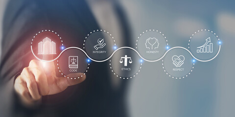 Corporate ethics and growth concept.  Interacts with a corporate ethics, surrounded by icons; code, integrity, honesty, respect, and ethics,  the foundation of a strong corporate code of conduct.