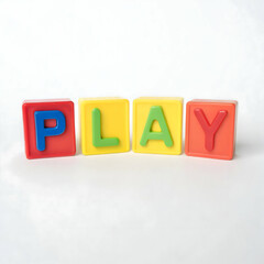 Fototapeta premium 3D alphabet blocks spelling PLAY on a crisp white background for educational and playful concepts 