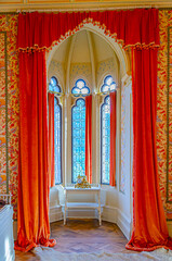 red velvet curtain and vintage window 