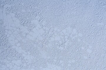 Intricate patterns are revealed in this high-resolution macro shot of a cracked, weathered surface.