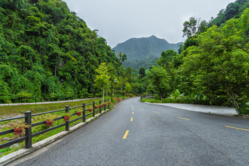 Scenic Asphalt Road With Tropical Mountains In The Background In Vietnam