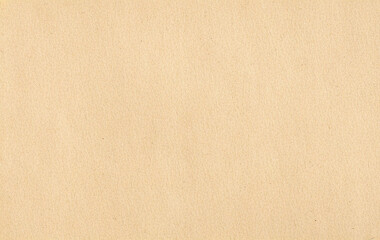 Kraft paper texture Subtle irregular stains and fibers in beige tones Panoramic background