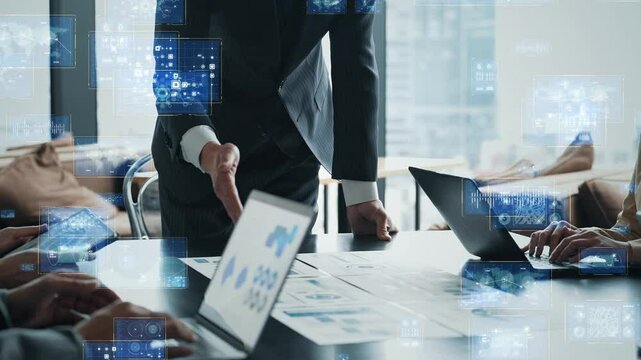 ミーティングするビジネスパーソンのグループとデジタルテクノロジーのコンセプト