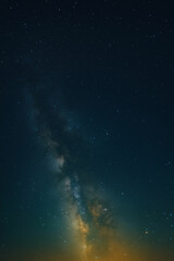 Obraz premium Starry night sky with a stunning galaxy view, cosmic stars scattered across a dark blue ethereal backdrop, perfect for backgrounds, wallpapers, or creative designs, unique design Pro.