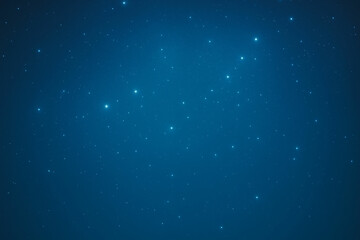 Obraz premium Starry night sky digital illustration with glowing celestial bodies and a smooth blue gradient, ideal for backgrounds, posters, or creative projects, offering a tranquil deep space vibe,