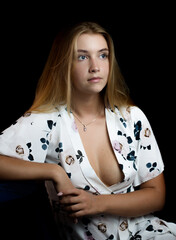 Portrait of beautiful sensual woman with blue eyes. Studio shot.