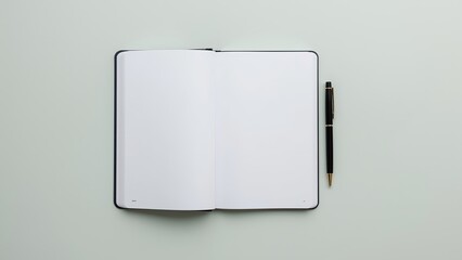 An open blank notebook with a sleek pen lying next to it, ready for new ideas and creativity.