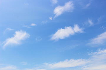 Obraz premium Bright blue sky and cloudy for graphic design or wallpaper.