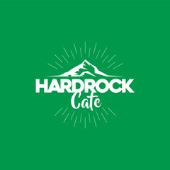 A logo design with green background with a mountain and the words "Hardrock Cafe" in white. The mountain is in the center of the image and the cafe is in the bottom right corner