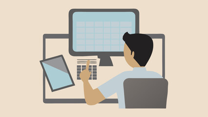Person working on computer with tablet and documents in a work from home office setting depicted