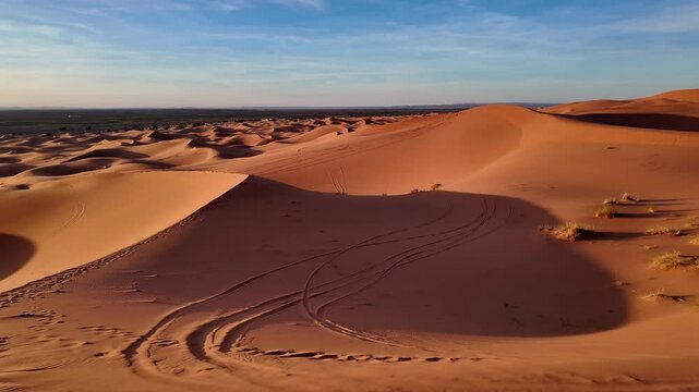 Merzouga, Morocco: Panoramic view of the sunset over the Merzouga from the Erg Chebbi sand dunes in the the Sahara desert in Morocco