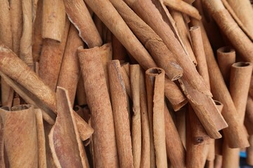 Cinnamon is a spice obtained from the inner bark of several tree species from the genus Cinnamomum. It is used mainly as an aromatic condiment and flavouring additive in a wide variety of cuisines