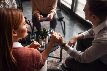 Group Meeting with Supportive Gesture and Emotional Connection