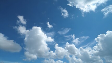 Stunning Blue Sky with Fluffy White Clouds: A Peaceful Nature Scene