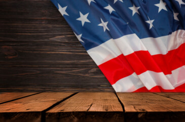 USA Flag and Wooden Background. United States flag draped over a rustic wooden surface. Suitable...